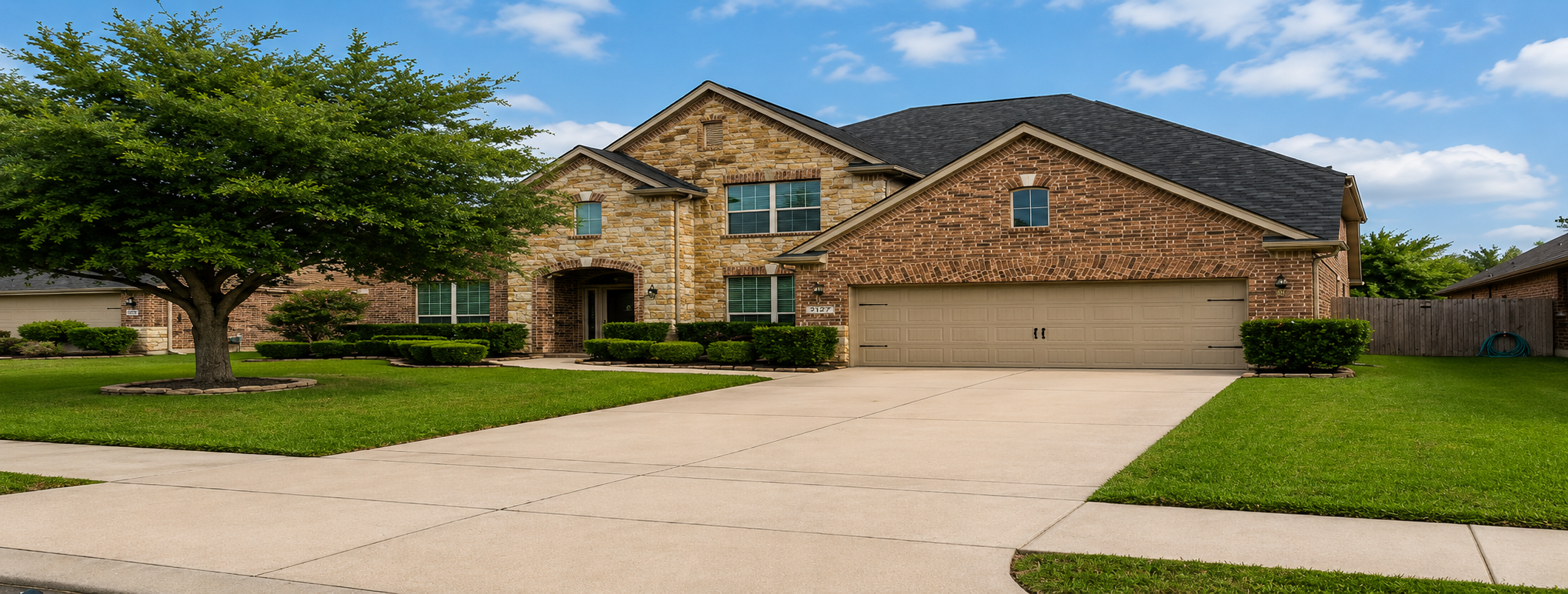 Clean house exterior and driveway